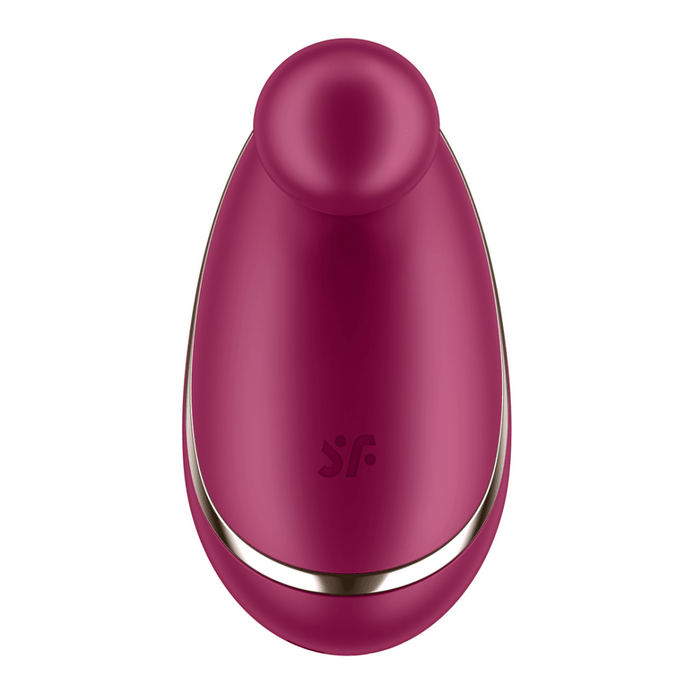 Satisfyer Spot On 1 oplegvibrator in bessentint, frontaal gefotografeerd op witte achtergrond met glanzende ovale vorm