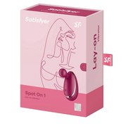 Satisfyer Spot On 1 verpakking in roze met lijnillustratie en productbeeld, vrijstaand op witte achtergrond