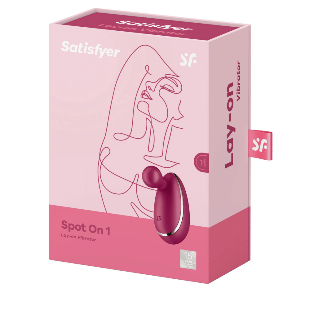 Satisfyer Spot On 1 verpakking in roze met lijnillustratie en productbeeld, vrijstaand op witte achtergrond