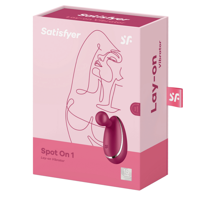 Satisfyer Spot On 1 verpakking in roze met lijnillustratie en productbeeld, vrijstaand op witte achtergrond