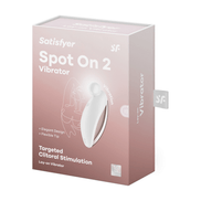 Satisfyer Spot On 2 oplegvibrator wit, productdoos verpakking, merknaam op doos, studio achtergrond