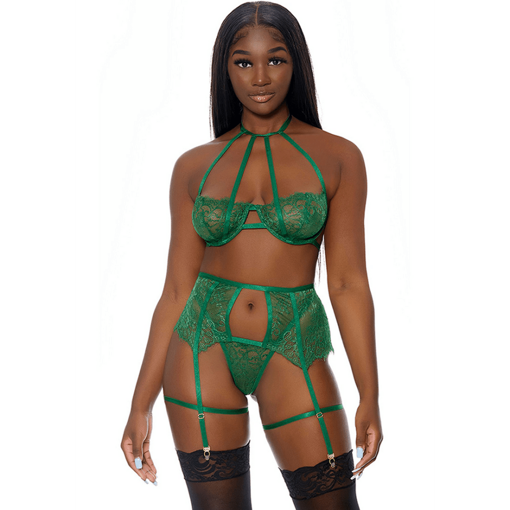 Model in Forplay In Full Bloom set groen, bloemenkant bh met strappy bandjes en jarretelgordel, maat L