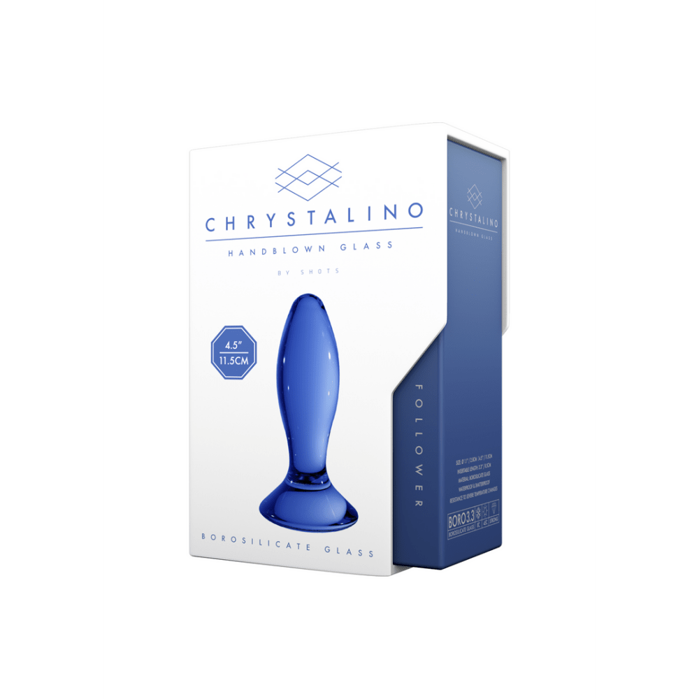 Blauwe Chrystalino Follower glazen butt plug naast witte verpakking, product en doos samen zichtbaar.