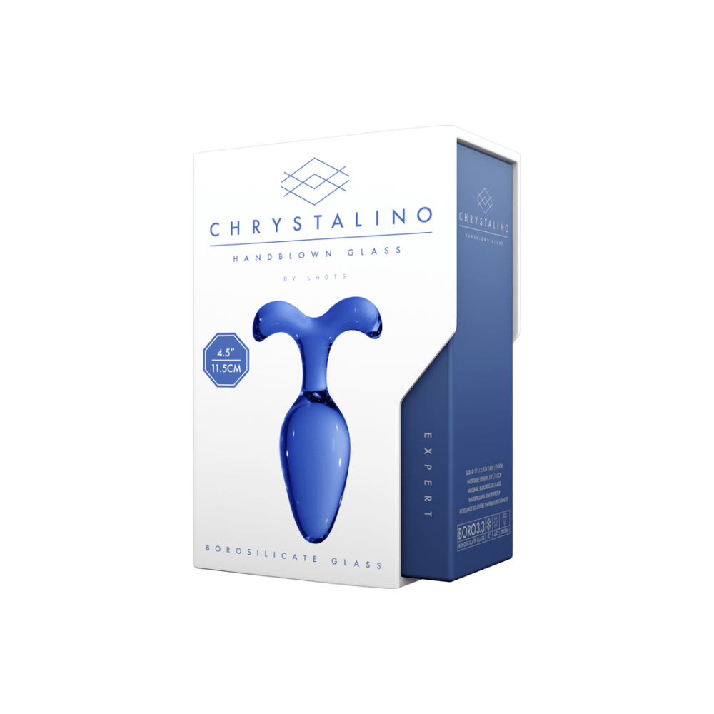 Chrystalino glazen buttplug Expert met witte verpakking, blauw product zichtbaar naast de doos.