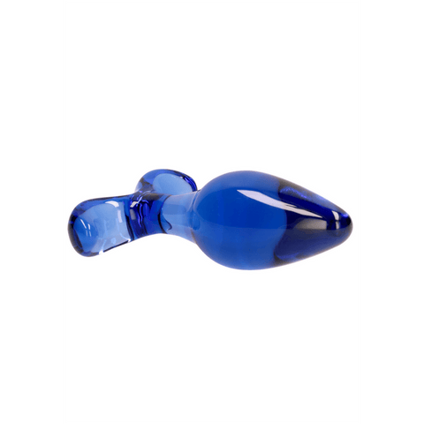 Blauwe Chrystalino glazen buttplug Expert, liggend op witte achtergrond met afgeronde vorm en brede voet.