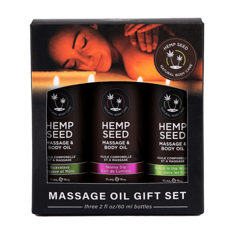 Verpakking van de Earthly Body Hemp Seed massageolie cadeauset met sfeervol design en zwarte doos op witte achtergrond