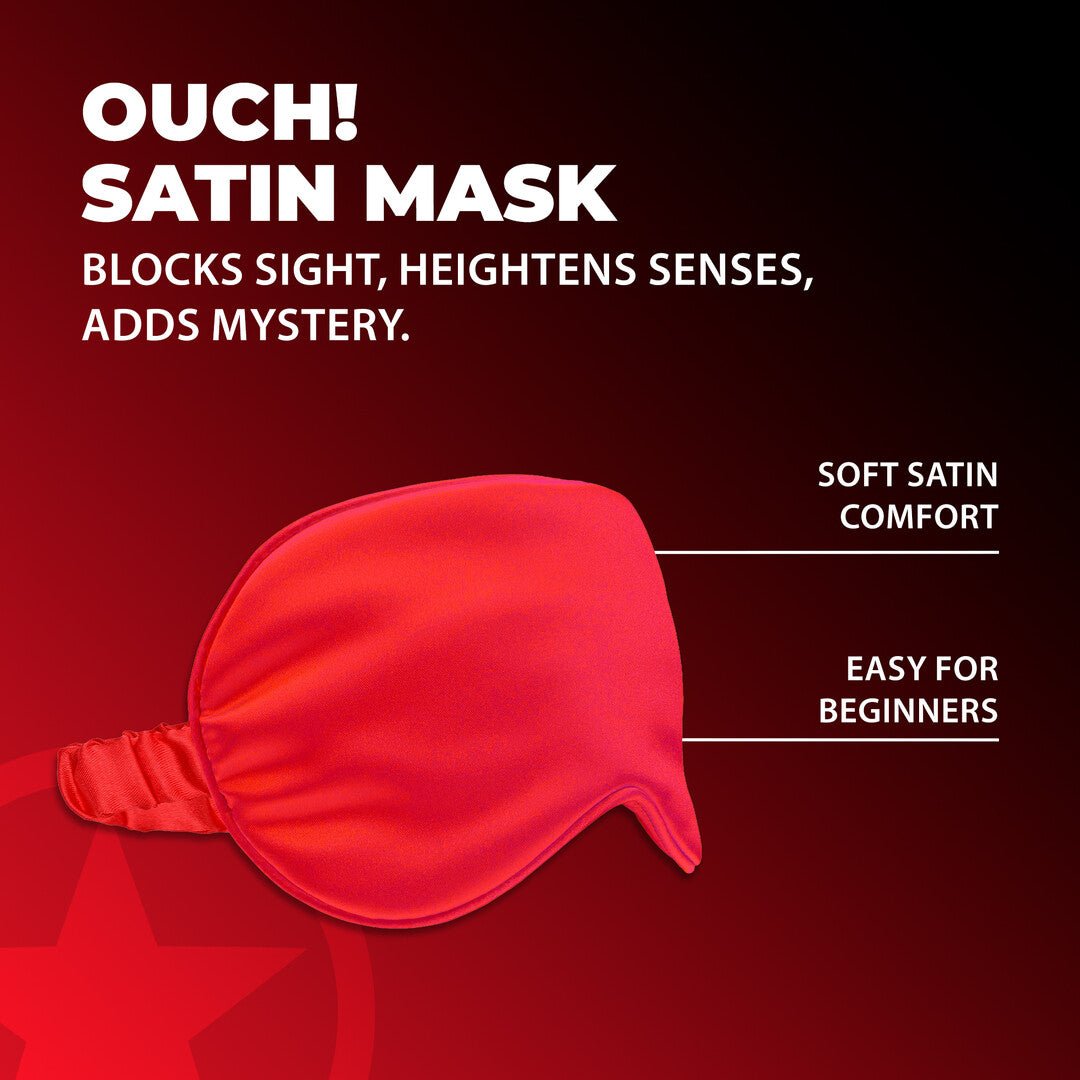 Ouch! by Shots Satin Mask rood op de productverpakking, frontaal afgebeeld tegen een donkere studio-achtergrond