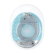 Verpakking van de Ouch! Heavy-Duty Diamond Handboeien in blauw, in doorzichtige blisterverpakking