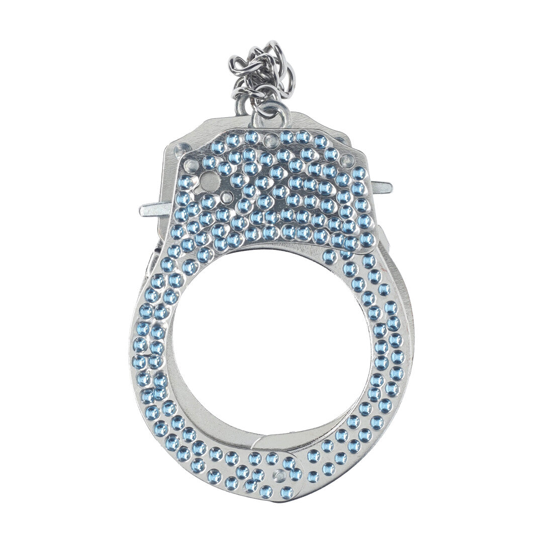 Close-up van de Ouch! Diamond Handboeien in blauw met zichtbaar vergrendelmechanisme en sleutel