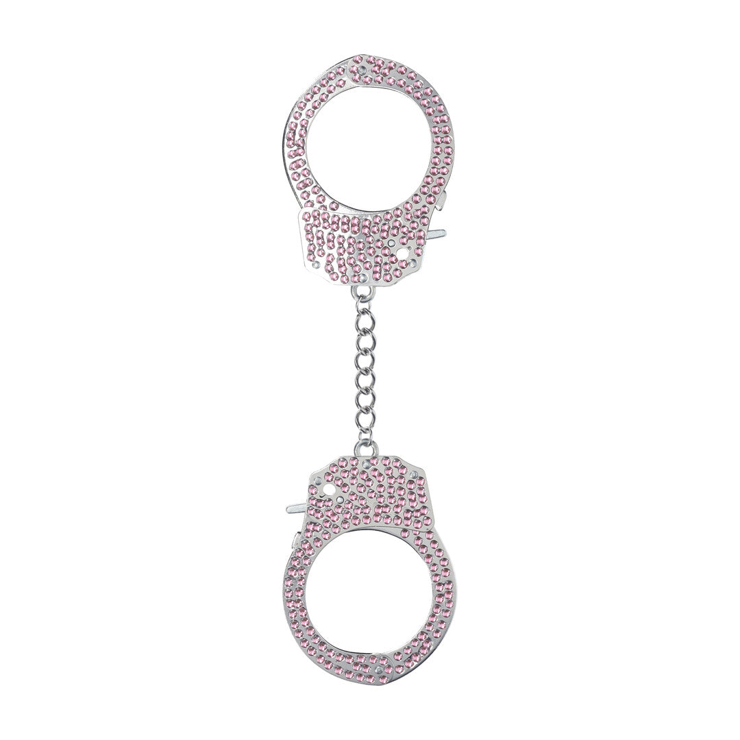 Ouch! Diamond Handboeien in roze, volledig bezet met fonkelende steentjes, verbonden door een metalen ketting