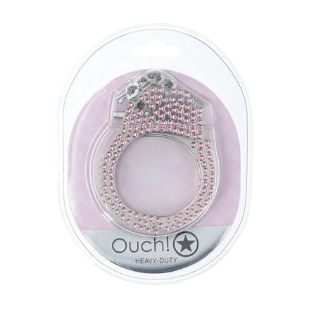 Verpakking van de Ouch! Heavy-Duty Diamond Handboeien in roze, in doorzichtige blisterverpakking