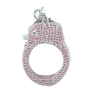 Close-up van de Ouch! Diamond Handboeien in roze met zichtbaar vergrendelmechanisme en sleutel