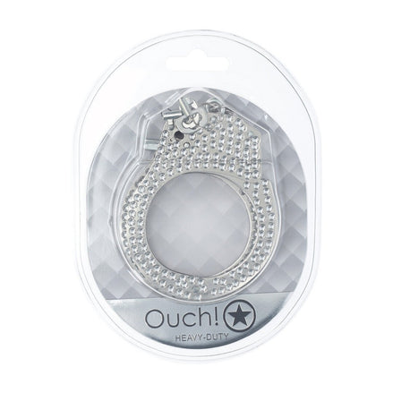 Verpakking van de Ouch! Heavy-Duty Diamond Handboeien in zilver, in doorzichtige blisterverpakking