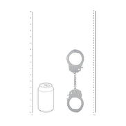 Formaatvergelijking van de Ouch! Diamond Handboeien in zilver naast een blikje en een liniaal