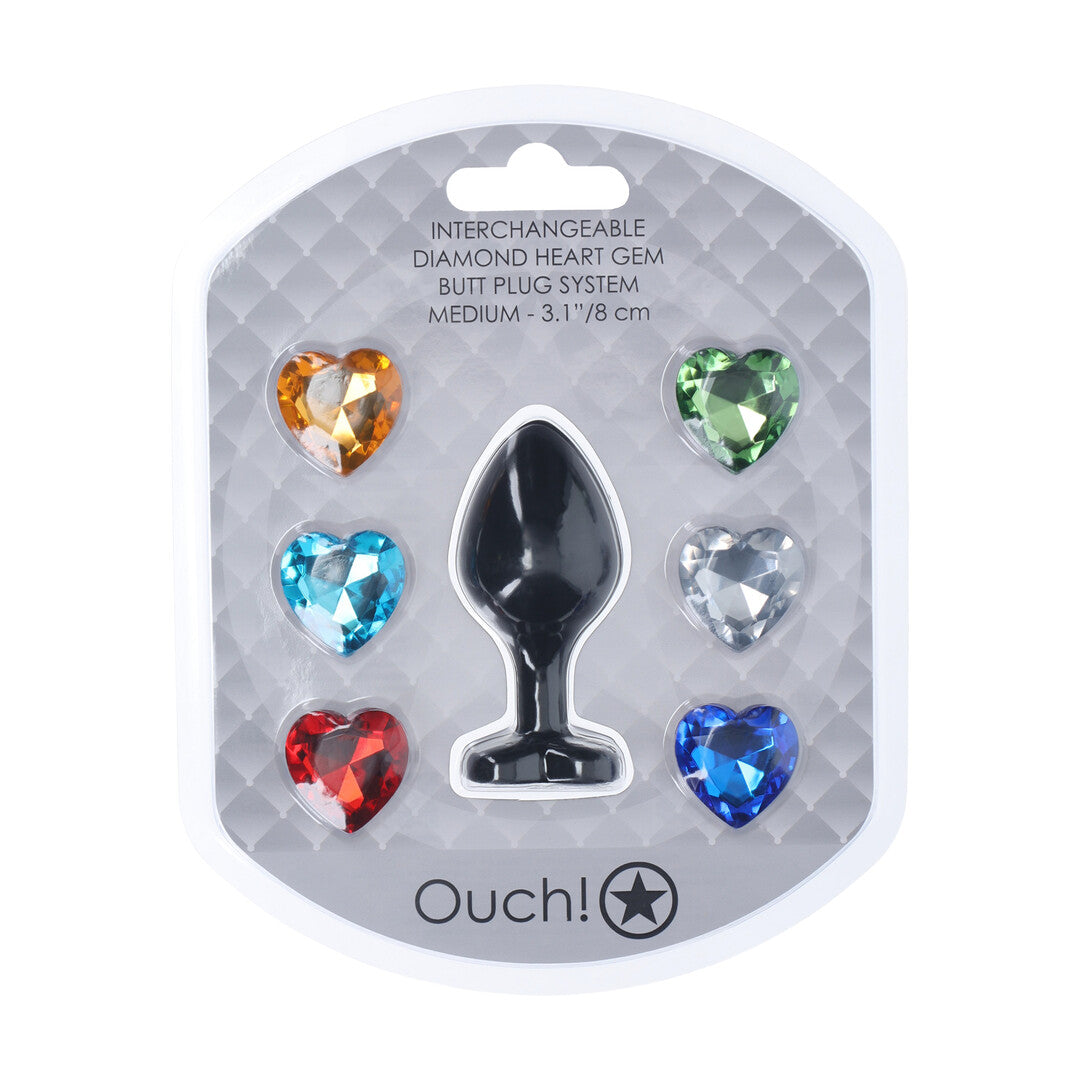 Verpakking van de Ouch! Interchangeable Diamond Heart Gem Buttplug Medium met 6 losse verwisselbare hartvormige stenen in verschillende kleuren
