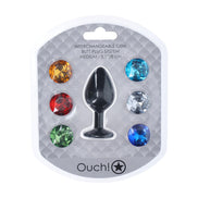 Verpakking van de Ouch! Interchangeable Gem Buttplug Medium met 6 losse verwisselbare ronde stenen in verschillende kleuren
