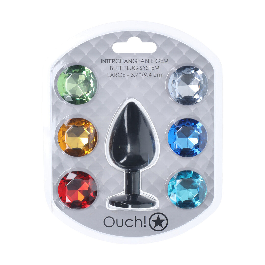 Verpakking van de Ouch! Interchangeable Gem Buttplug Large met 6 losse verwisselbare ronde stenen in verschillende kleuren