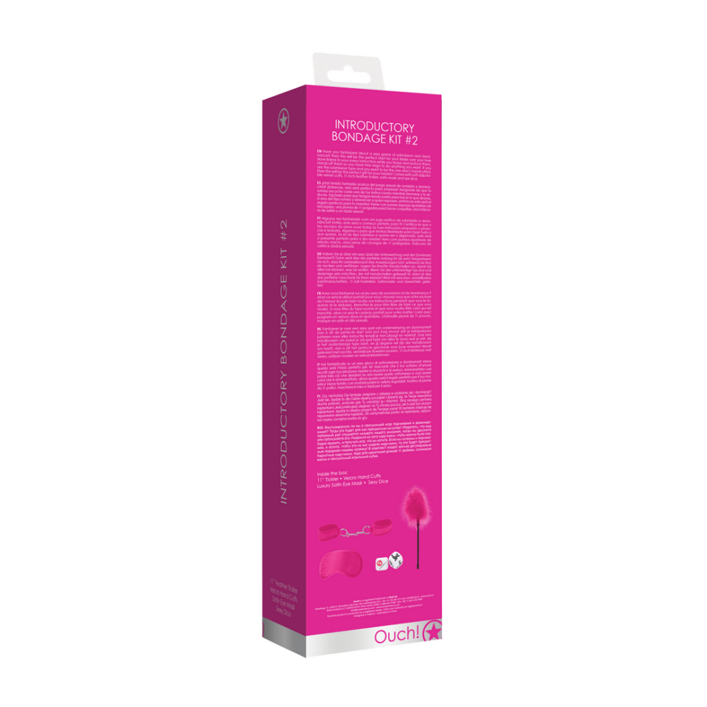 Zijkant productverpakking, roze bondage set met fluwelen boeien en dobbelstenen zichtbaar