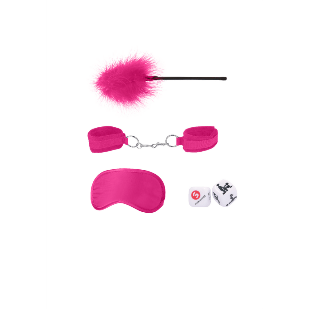 Roze bondage set voor beginners, overzicht met fluwelen boeien, blinddoek en erotische dobbelstenen