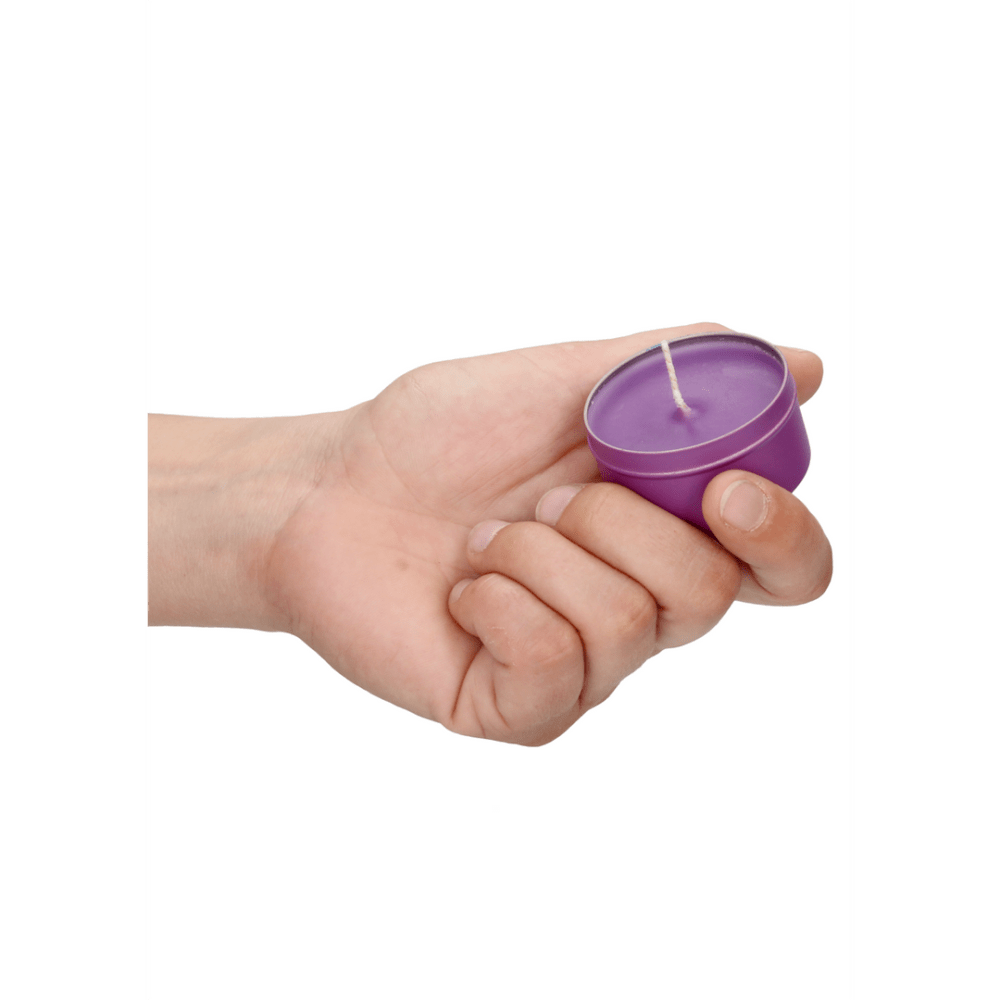Ouch! Ondeugend Paarse Massagekaars in hand, warme massageolie voor intieme ontspanning