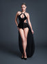 Allure Body Mesh rokje latex look zwart, lingerie studiofoto vooraanzicht op model, donkere achtergrond, maat XL