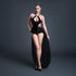 Allure body met mesh rokje zwart latex look, lingerie studiofoto vooraanzicht op model met transparante rok, maat L