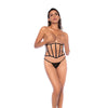 Zwarte Mapalé korset set met G string one size, vrouw staand in studio met corrigerende lijnen en opengewerkte details