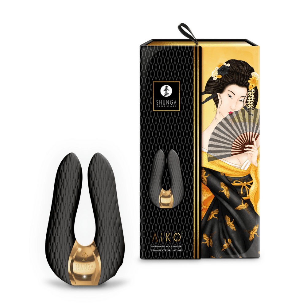 Shunga AIKO clitorale stimulator zwart naast de originele verpakking