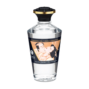 Shunga Aphrodisia Verwarmende Olie Vanille Fetish 100 ml in heldere glazen fles met zwarte dop