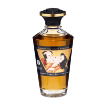Shunga Aphrodisia Olie Caramel Kisses 100 ml in sierlijke amberkleurige fles met zwarte dop