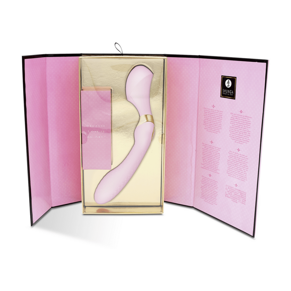 Open luxe verpakking van de Shunga ZOA lichtroze clitoris vibrator met binnenlayout en productpresentatie