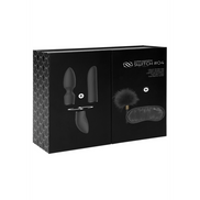 Zwarte Switch by Shots vibrator set in doos voorzijde met productfoto en titel Kracht & Stijl