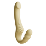 Beige Odes Within strapless strap-on vibrator in zijaanzicht met dubbele gebogen vorm en subtiele groeflijnen.