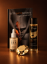 Het boek Let's MissBehave, Where food meets pleasure, naast Slow Sex Shimmer Dry Oil, Orgie Sexy Therapy Amor massageolie en een goudkleurig diamantvormig accessoire, warm uitgelicht op een koperbruine achtergrond