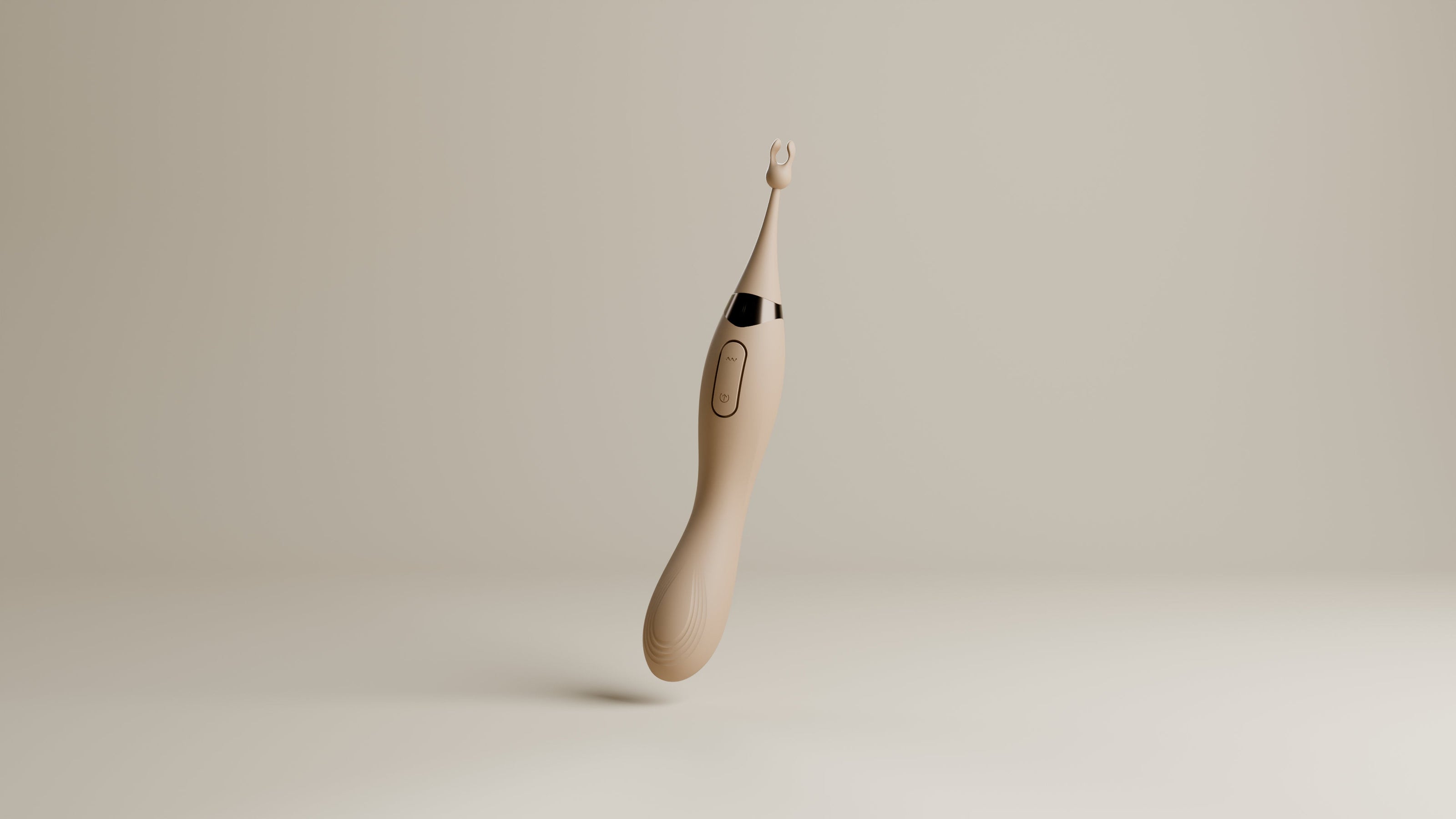 Odes Duo G-spot en clitoris vibrator in taupe, zwevend gefotografeerd met gebogen vorm en kleine stimulator