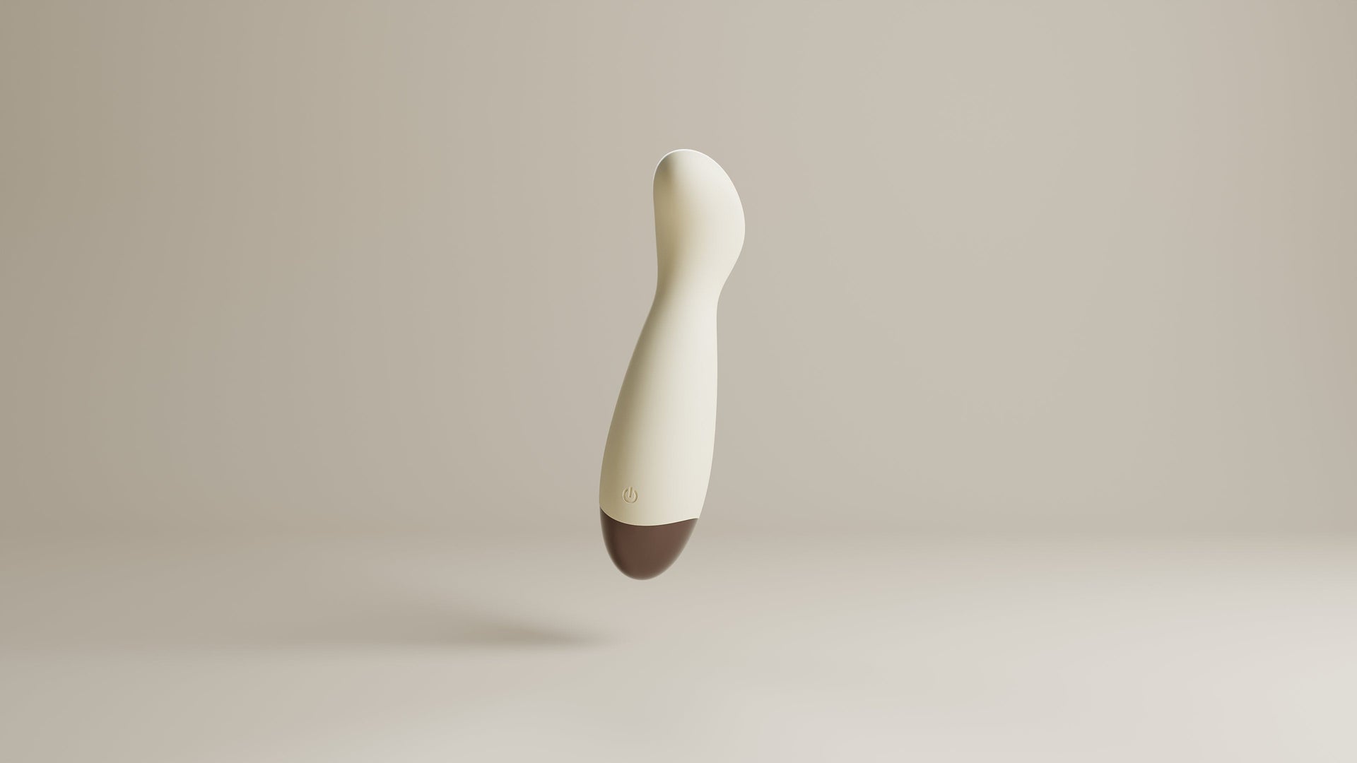 Odes Ease Mini Wand Vibrator in beige, schuin zwevend met afgeronde kop, powerknop en bruine onderzijde
