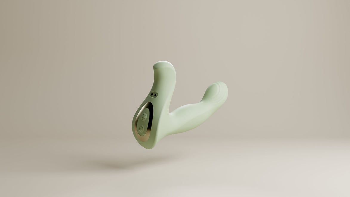 Odes Ombre prostaatvibrator in saliegroen, schuin gefotografeerd met bedieningspaneel en laadpunten