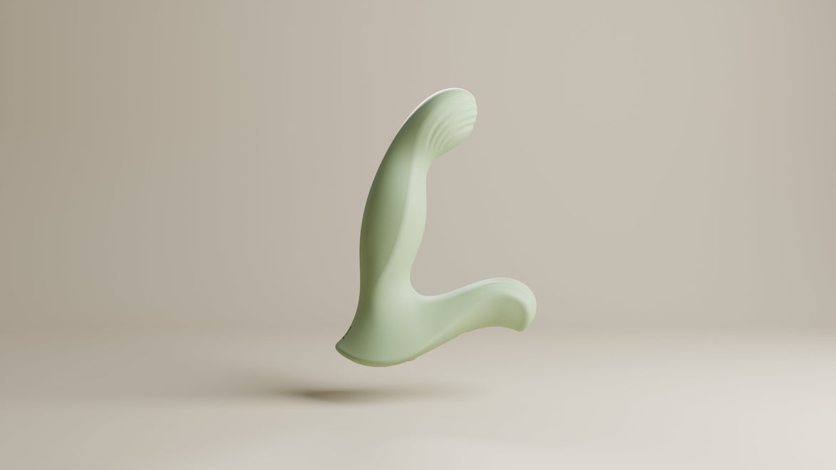 Odes Ombre prostaatvibrator in saliegroen, zwevend in zijaanzicht met gebogen vorm en geribbelde kop