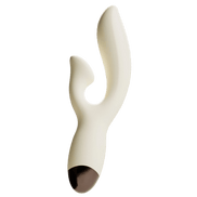 Crèmewitte Odes Seduce Tarzan vibrator in close-up met gebogen dubbele vorm en bruine onderzijde.