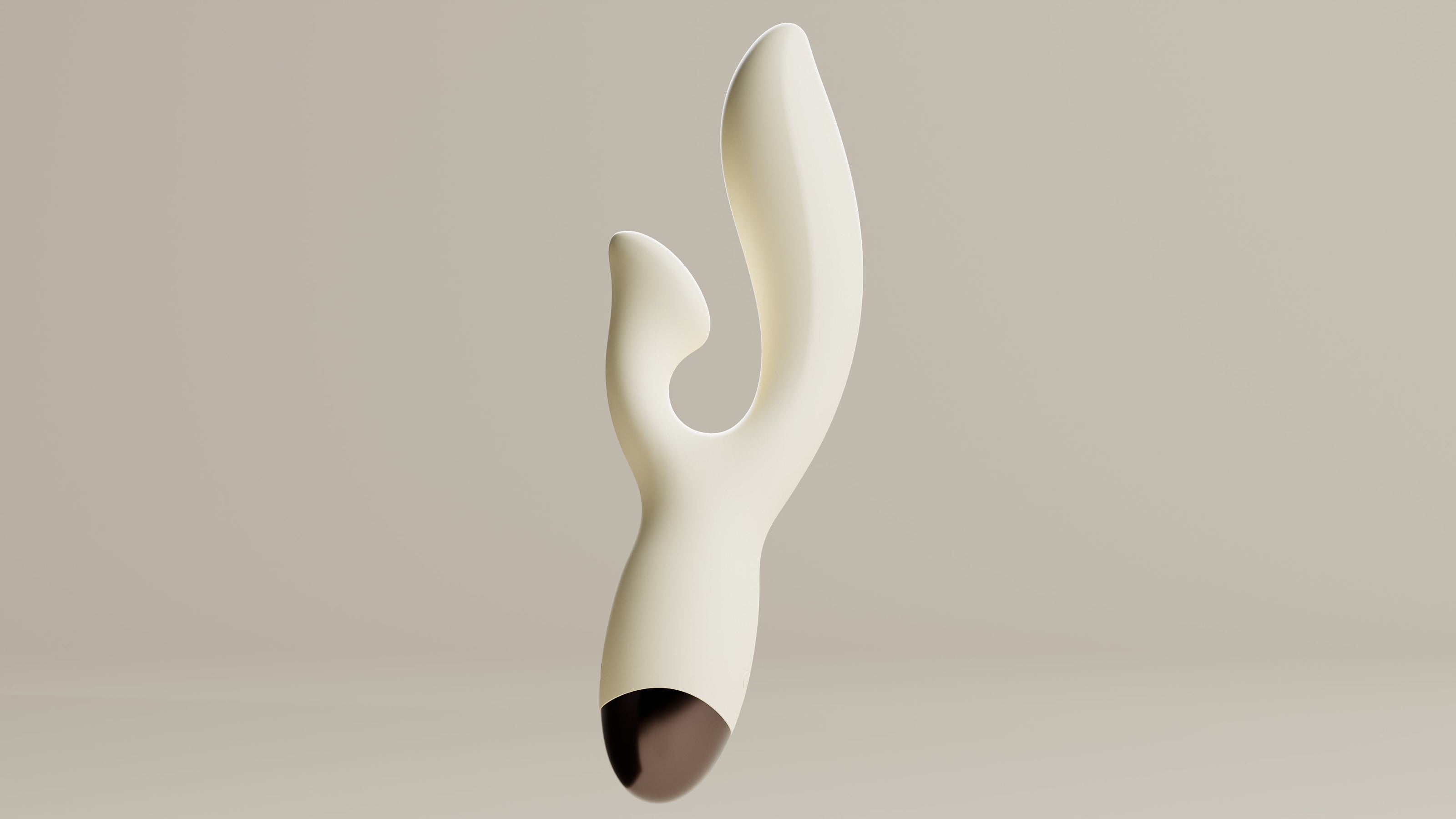 Odes Seduce Tarzan vibrator in crème wit, close-up van de gebogen dubbele vorm met gladde matte afwerking