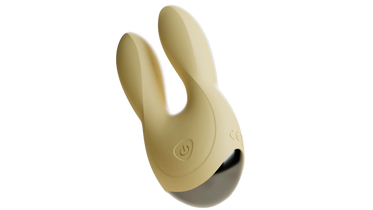 Beige Odes Sense wand vibrator in close-up met dubbele afgeronde kop, powerknop en donkere basis.