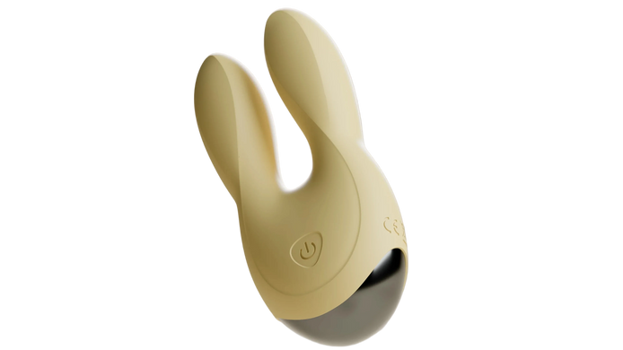 Beige Odes Sense wand vibrator in close-up met dubbele afgeronde kop, powerknop en donkere basis.