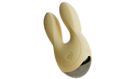 Beige Odes Sense wand vibrator in close-up met dubbele afgeronde kop, powerknop en donkere basis.