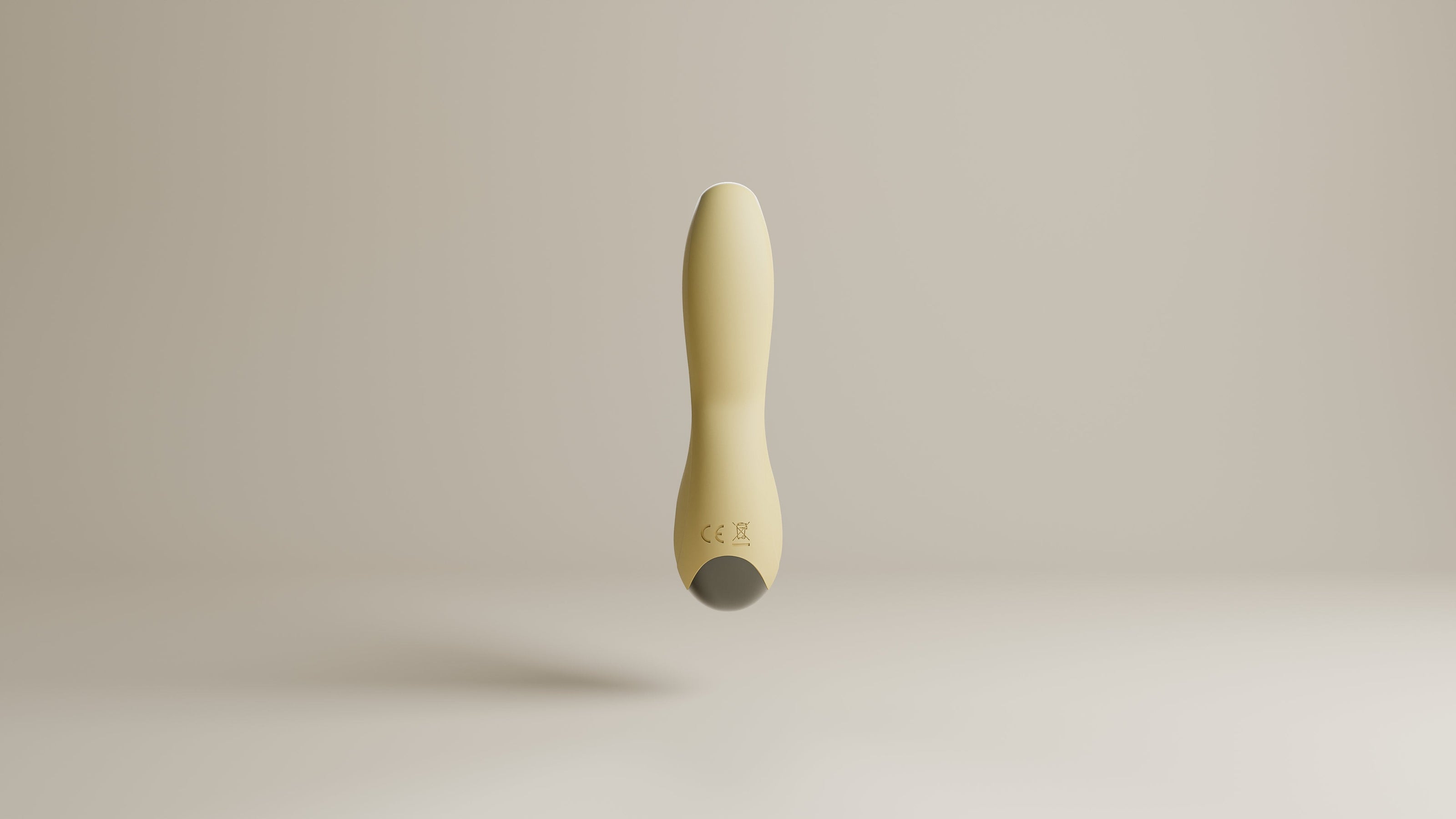 Odes Sense wand vibrator in beige vanuit zijaanzicht, met smalle tip, zwarte accentband en gebogen vorm