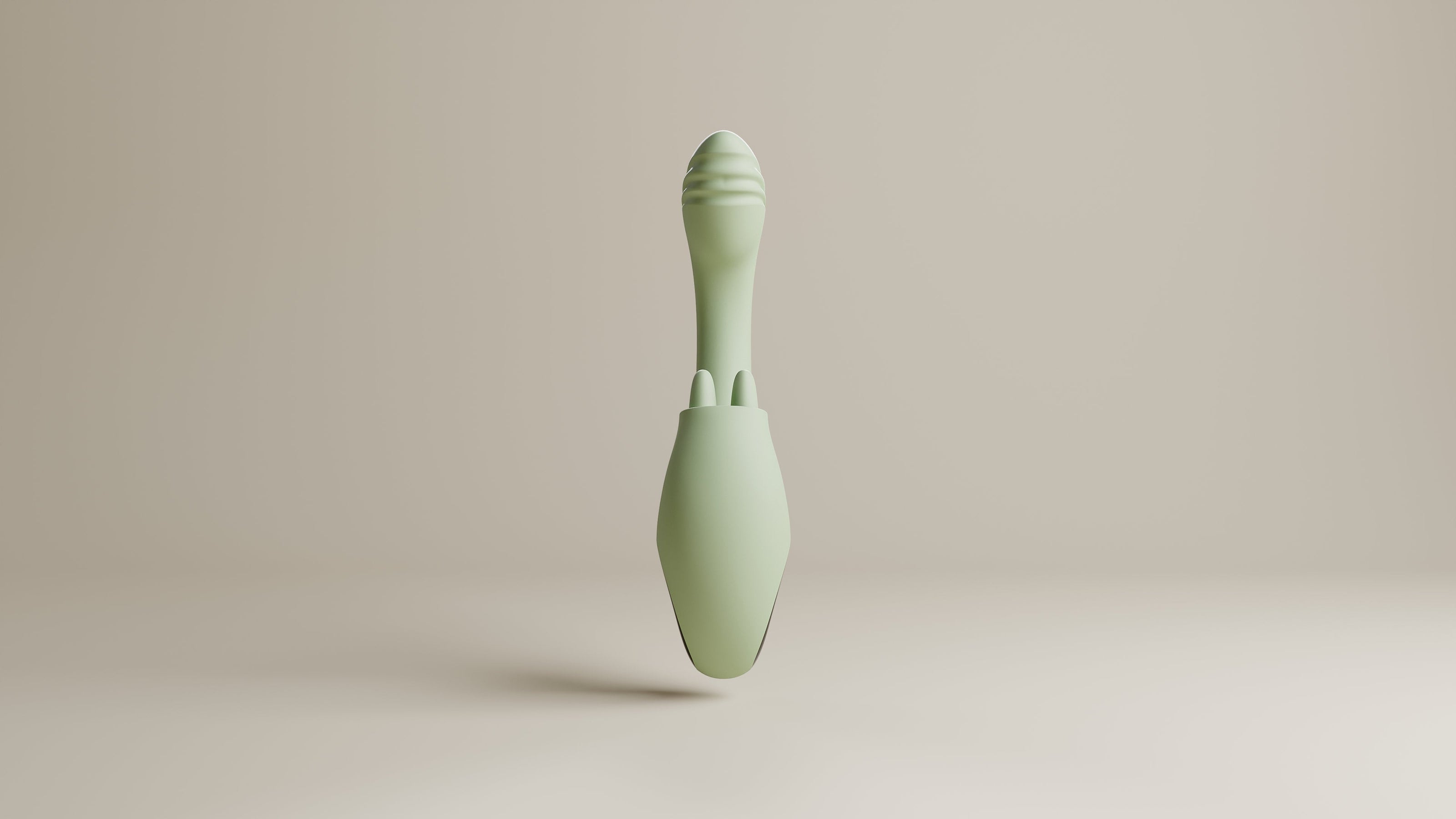 Saliegroene Odes Unite rabbit vibrator vanaf de achterkant, met ribbels aan de top en open ringbasis