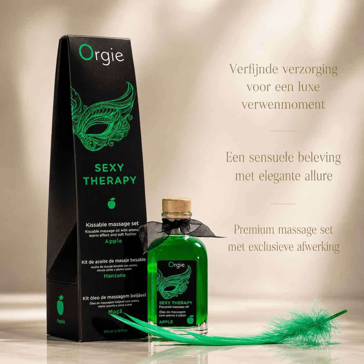 Orgie Lips Massage Kit 100 ml met groene appelolie, zwarte verpakking, veer en tekst over luxe verwenmoment
