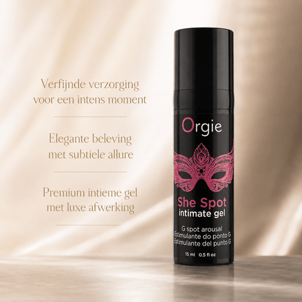 Orgie She Spot Gel 15 ml zwarte pompflacon met roze maskerprint en tekst over premium intieme gel