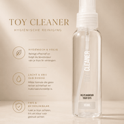 Pharmquests Speelgoedreiniger Spray 100 ml in transparante flacon met Toy Cleaner tekst op beige sfeerbeeld.